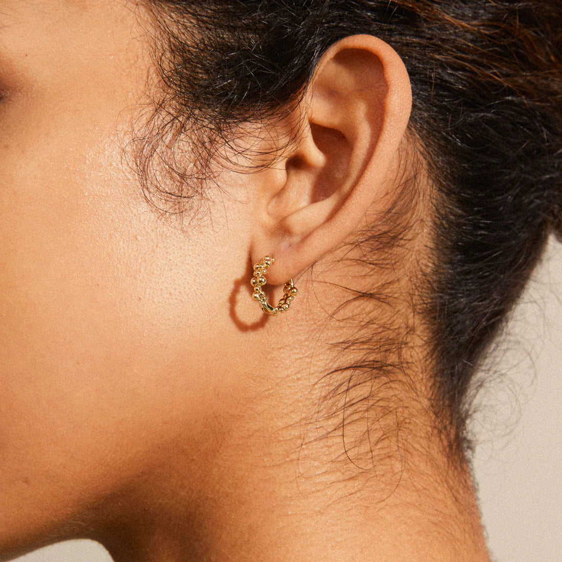 SOLIDARITY small bubbles hoop earrings